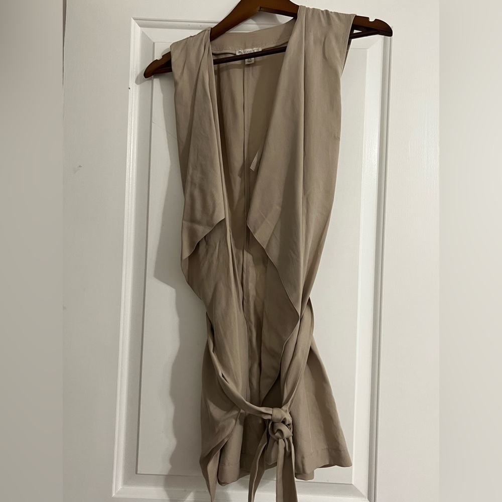 Long vest, layered front, ties around the waist